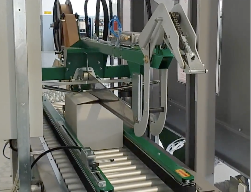 牛皮纸湿水打包机-湿水牛皮纸全自动封箱机-封箱机检修