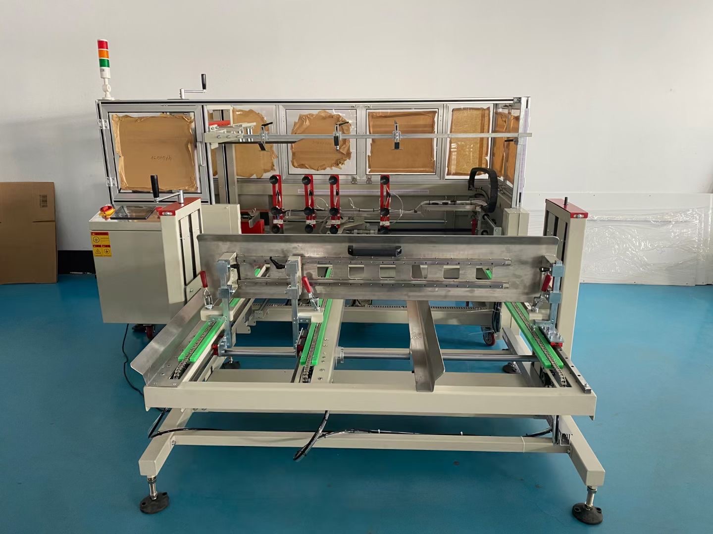 自动输送储料箱开箱机-直进式开箱机-南京纸箱开箱机